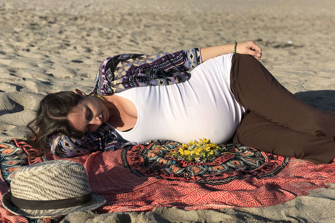 Kristin pregnant at the beach - Acupuncture during Pregnancy