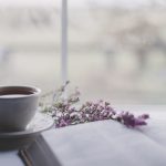 cup of tea, book, flowers in front of window - Simple Anti-Inflammatory Tea